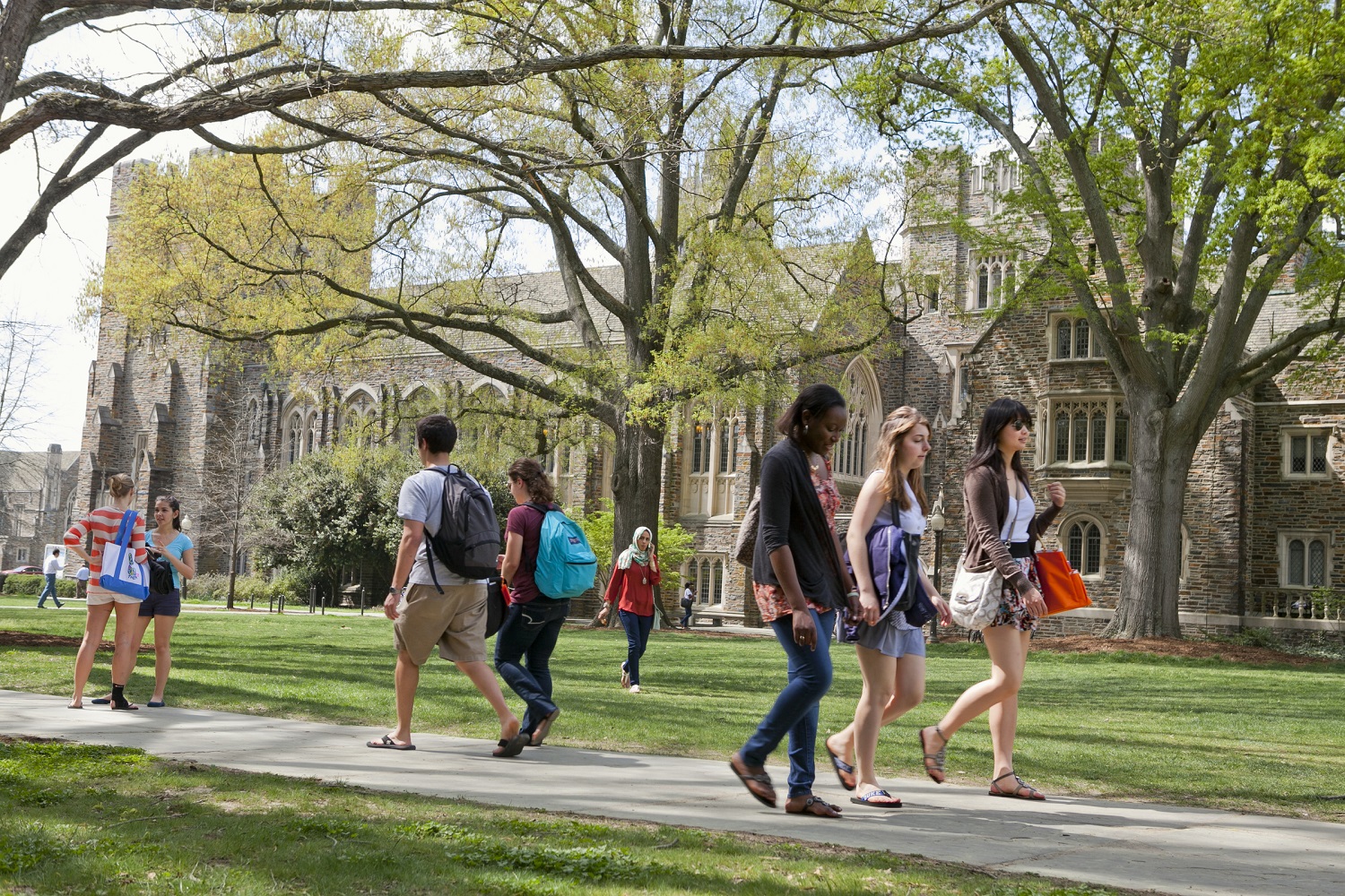 Students walking across the Duke University campus.