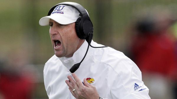 Former Kansas football coach David Beaty is suing the school for breach of contract.
