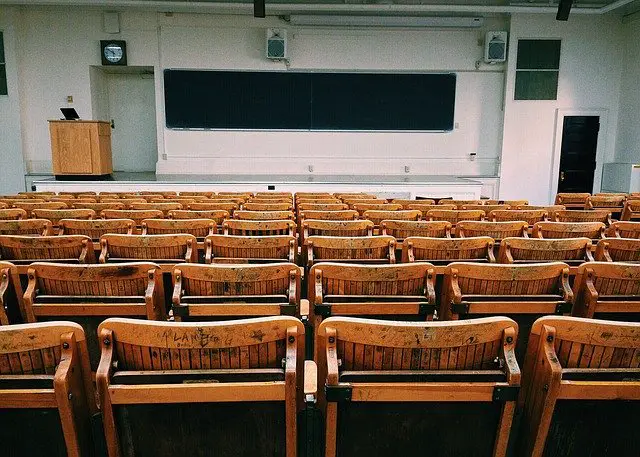 photo-of-empty-lecture-hall-after-college-went-bankrupt