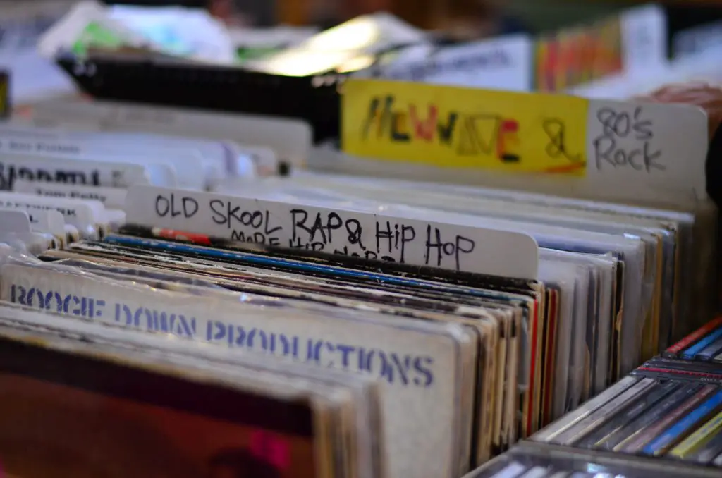 A drawer full of records, with a hip-hop track sticking out.