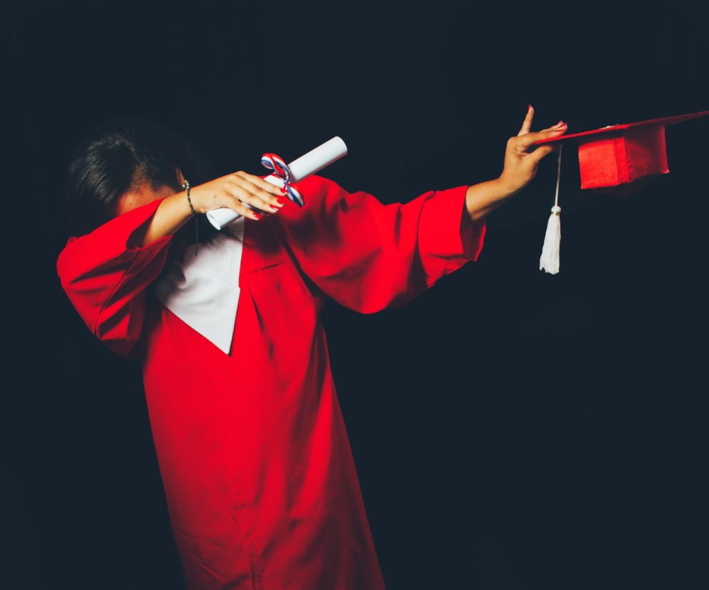 photo-of-girl-graduating-knowing-about-student-debt