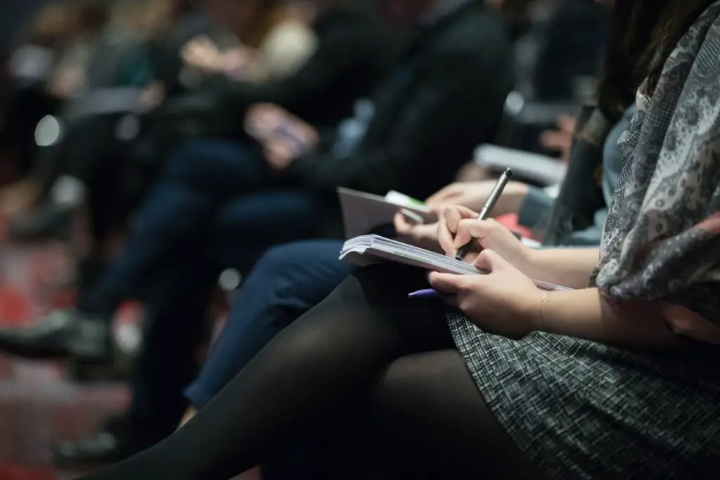 Photo of students taking a class in a lecture hall