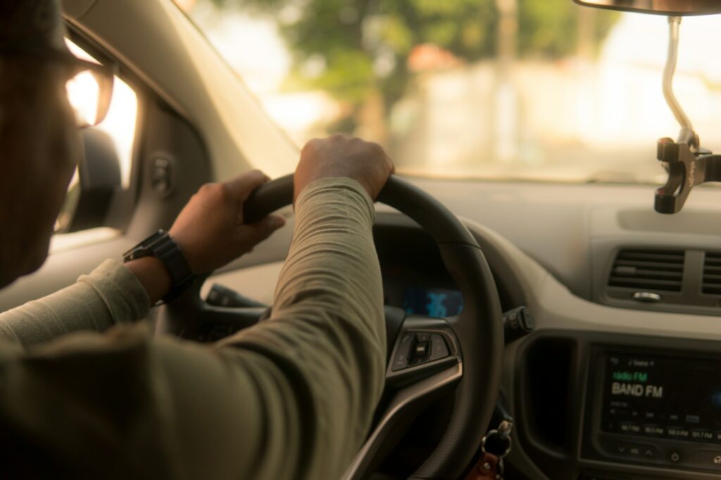 Photo of someone driving a car