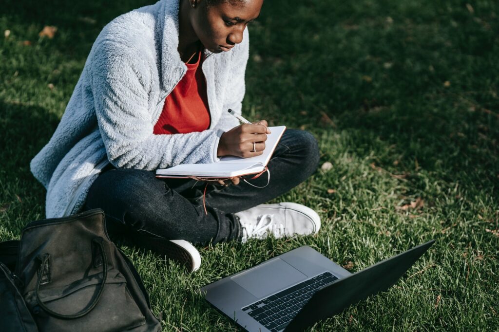 photo-of-girl-using-laptop-targeted-by-student-loan-scam