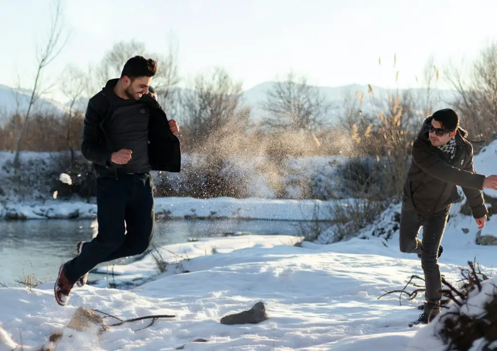 two men in a snowball fight