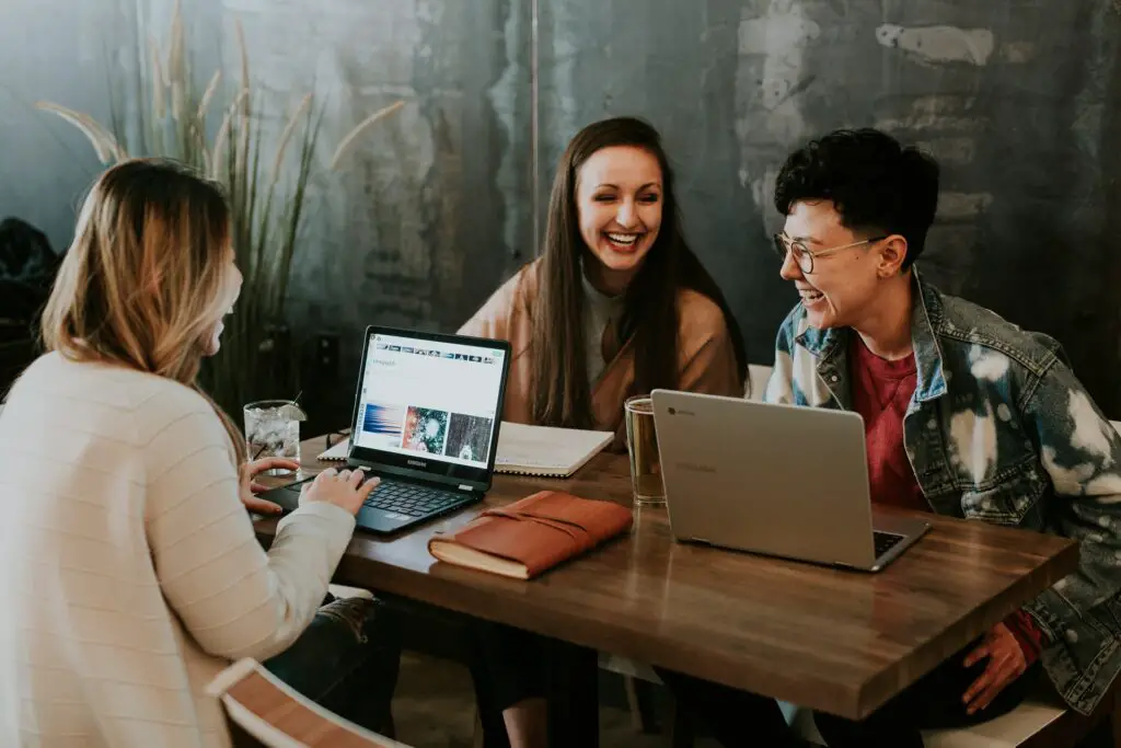 students smiling while studying