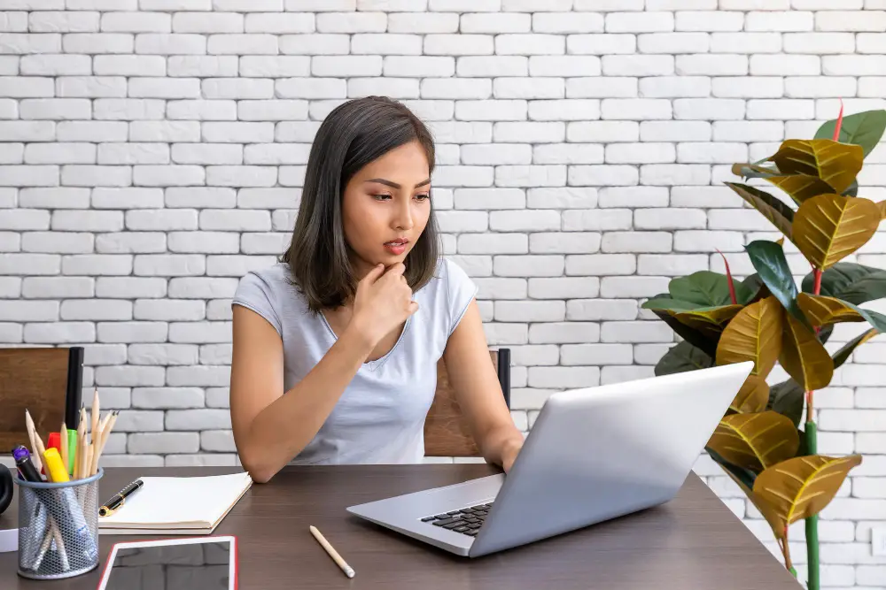 A female college freshman thinks about her career quiz assessment results to help her decide on a college major