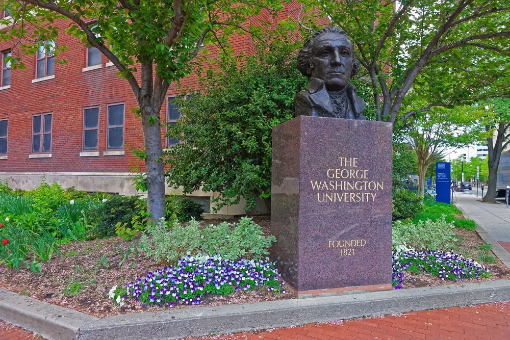 Statue of George Washington is located in his university in Washington D.C