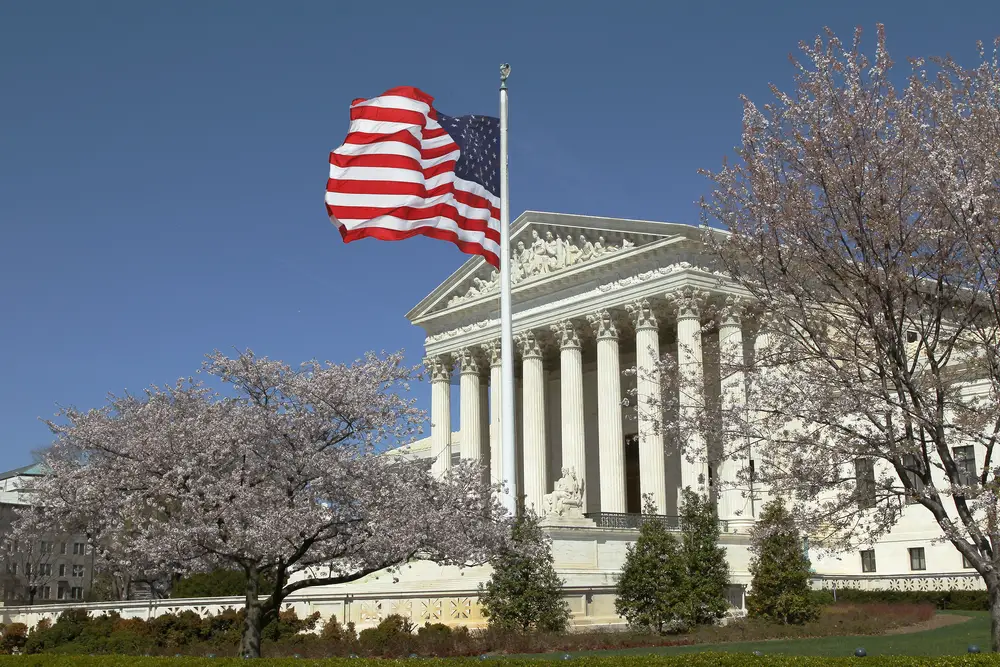 US Supreme Court with US flag