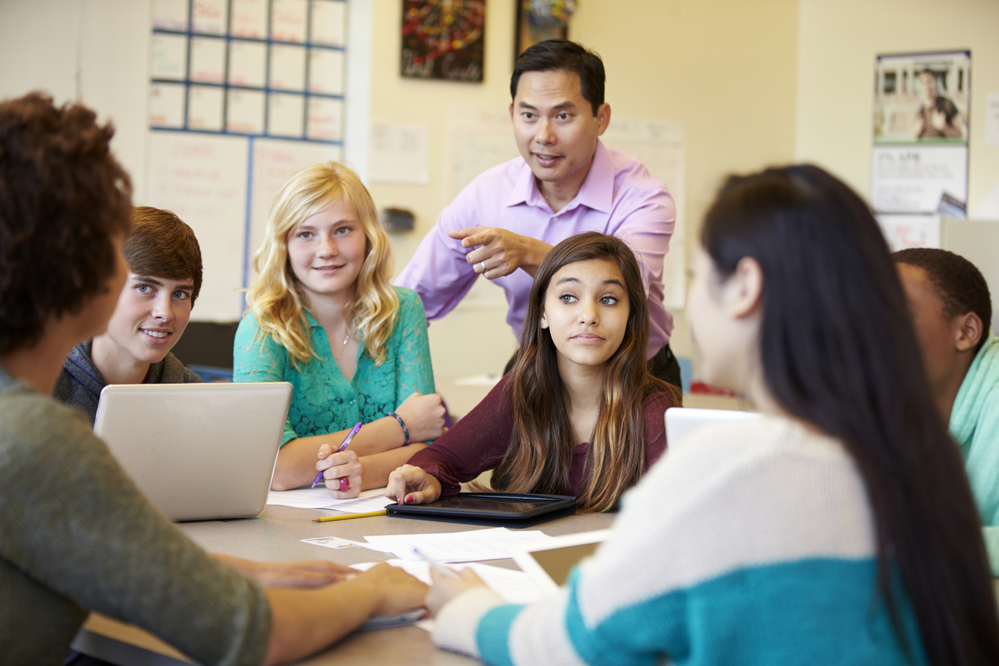 A group of male and female high school students taking advanced classes