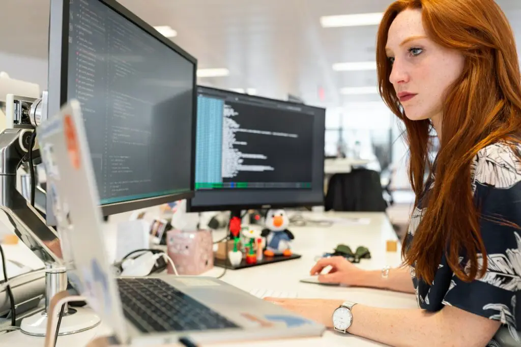 photo-of-data-scientist-looking-at-screens