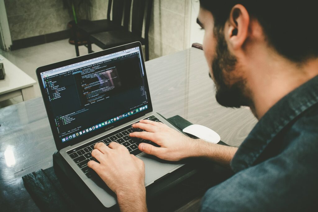 photo-of-data-scientist-working-on-computer