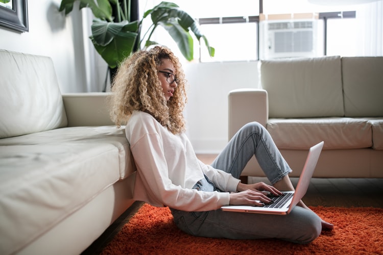 A student working on her laptop