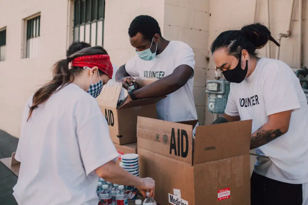 Volunteers unboxing supplies