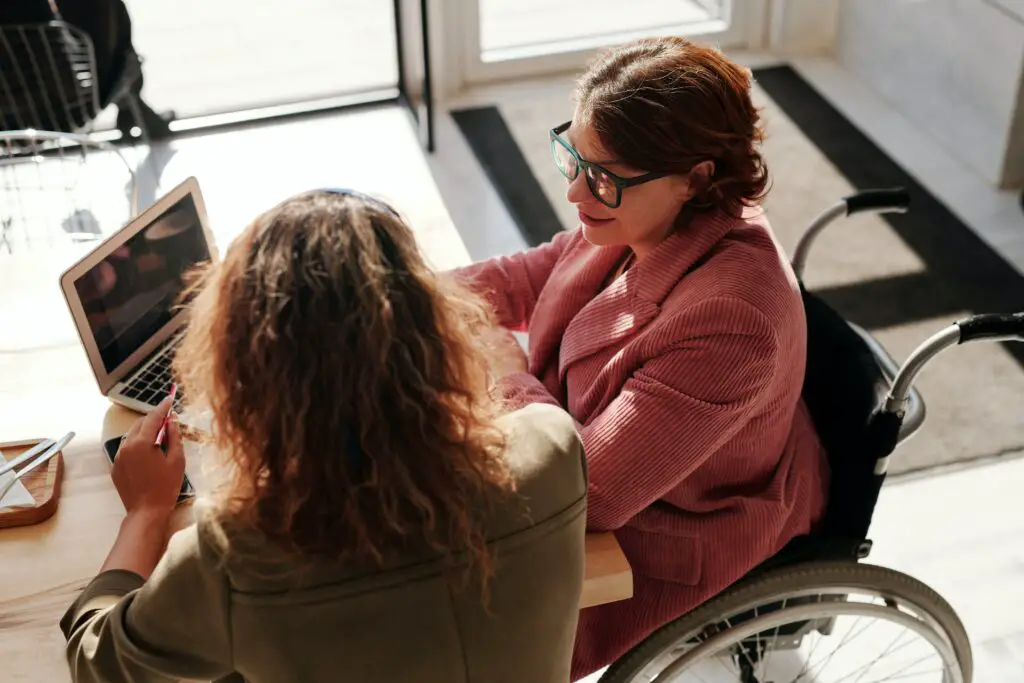 Two women discussing