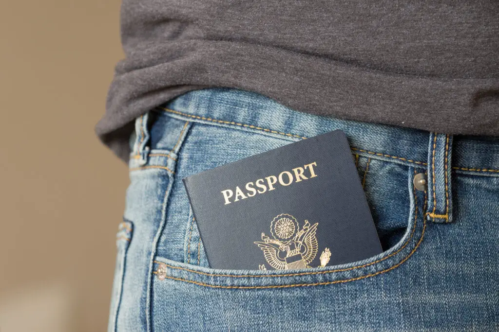 Closeup of US passport in jeans pocket