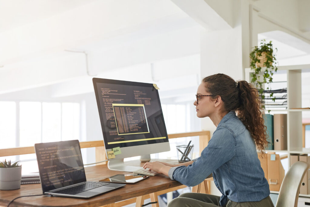 photo-of-female-programmer-working-on-computer