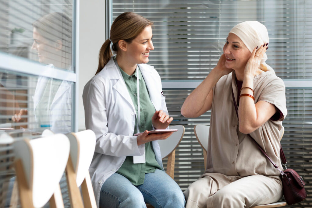 photo-of-radiation-therapist-talking-to-cancer-patient