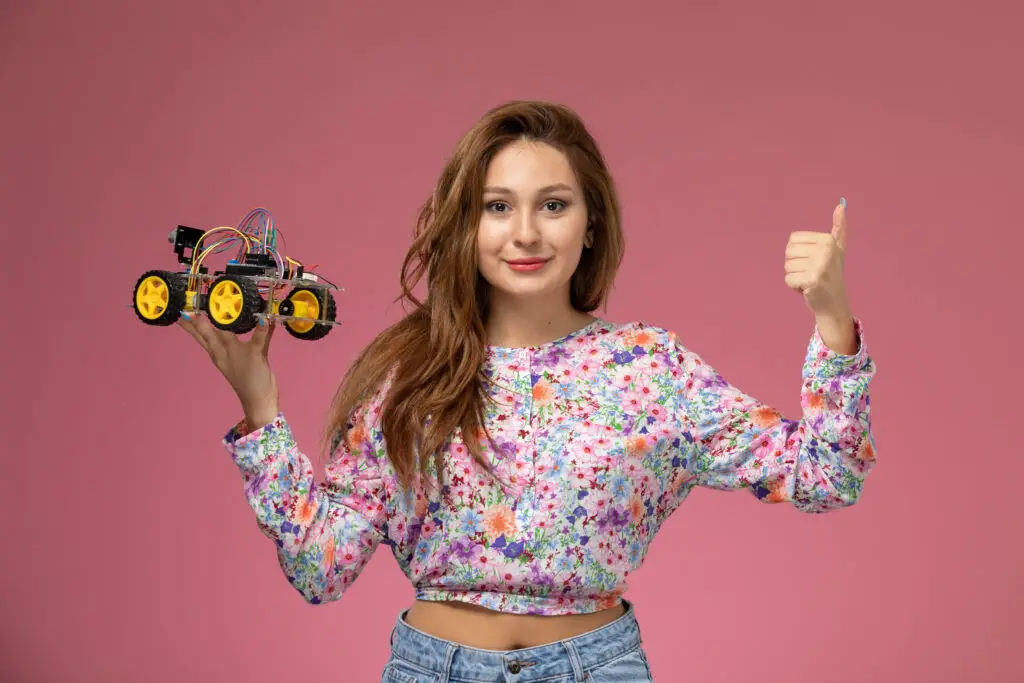 Woman holding a toy car