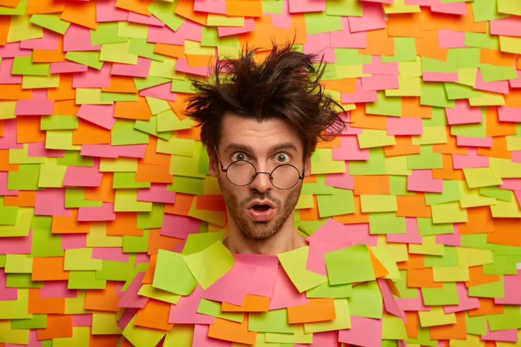 photo-of-stressed-college-student-covered-in-sticky-notes