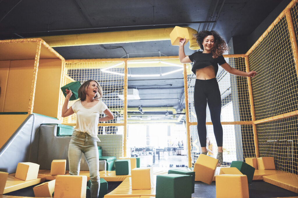 Women playing on a trampoline