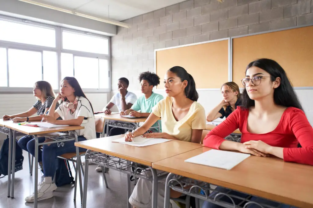 group of students listening attentively during a hard class