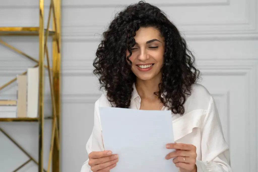 a woman receiving a college acceptance letter 
