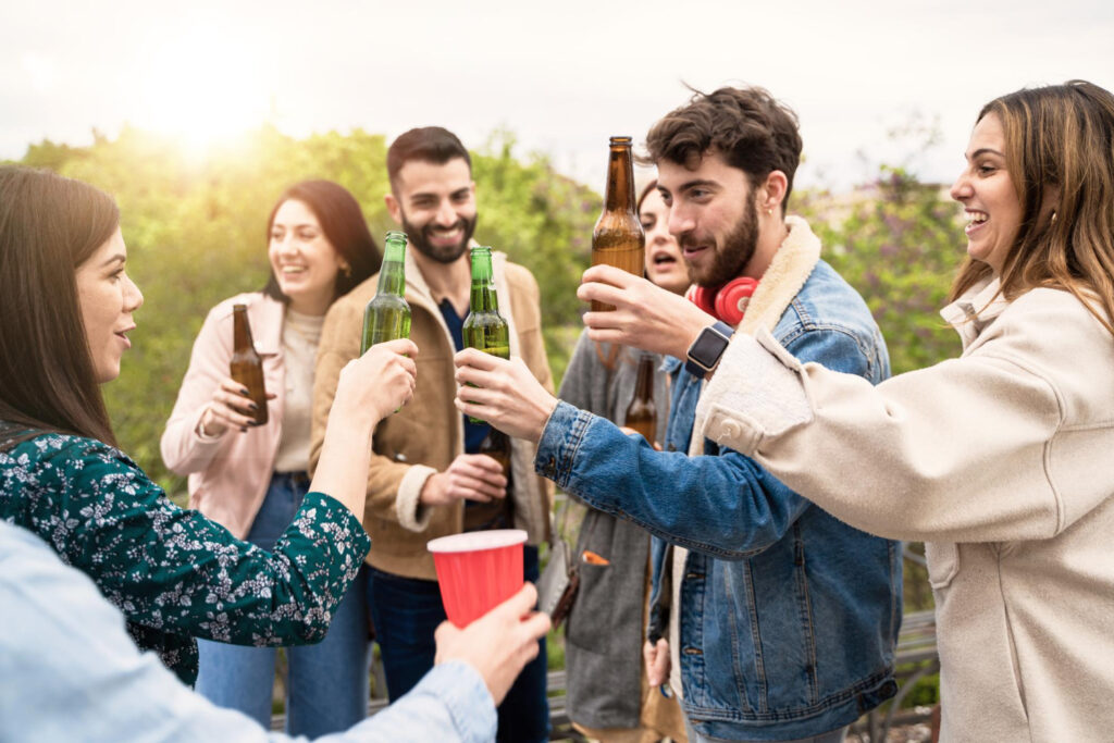 photo-of-michigan-college-town-students-drinking-beers-saying-cheers