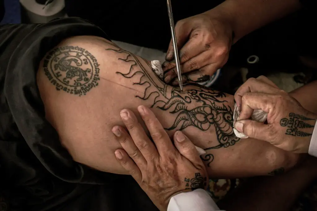 Tattooing a person's arm