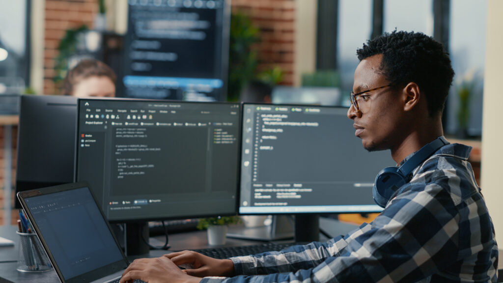 African American man working on computer 