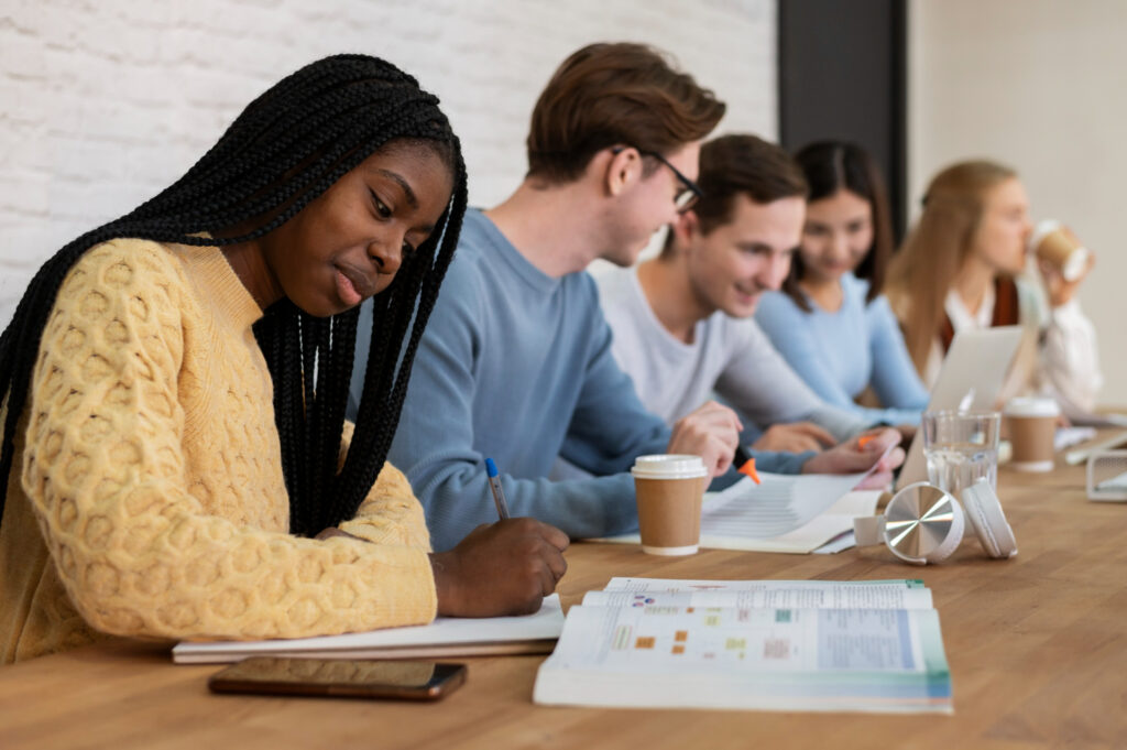 high school students learning together to get high grades that can impress during college admissions