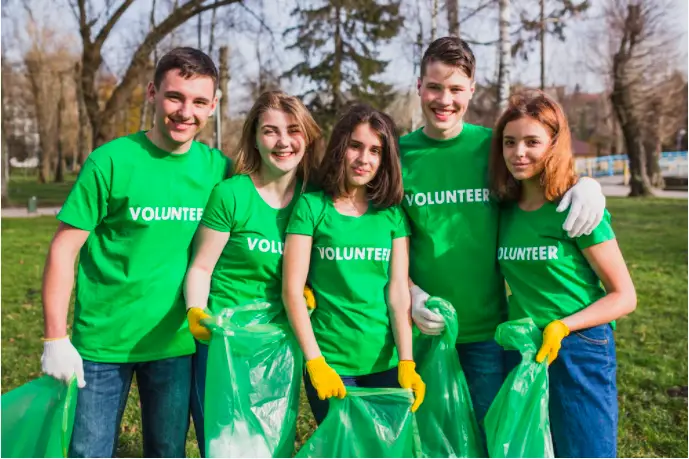 a couple of college volunteers for environmental causes