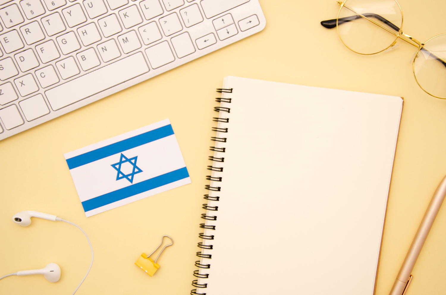an Israel flag with study materials