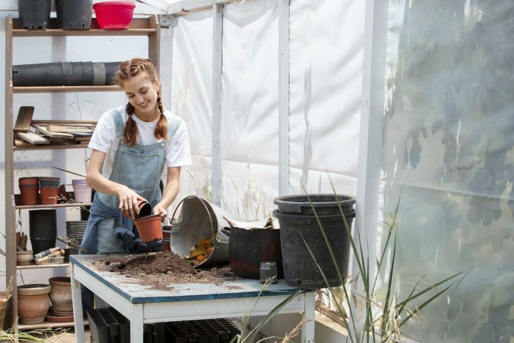 photo-of-college-student-composting-to-reduce-carbon-footprint