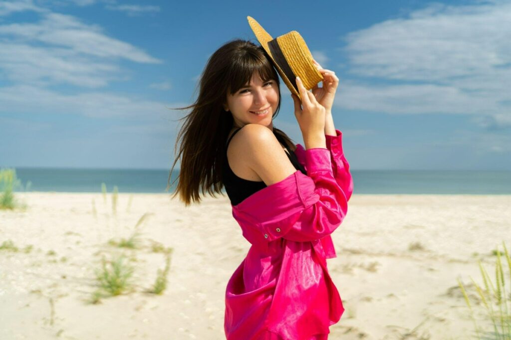 Young woman posing on a beach