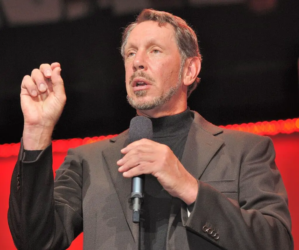 Richest-people-without-college-degree-larry-ellison-speaking-at-an-event
