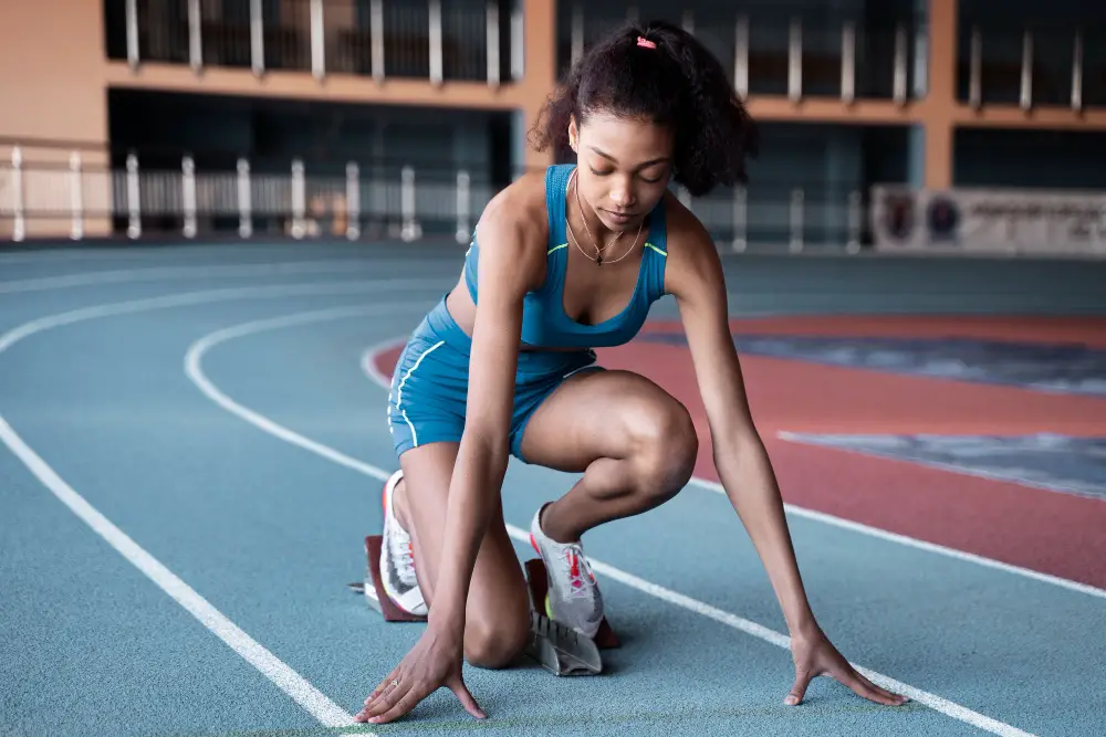 female-athlete-on-race-track-participating-in-extracurricular-sport