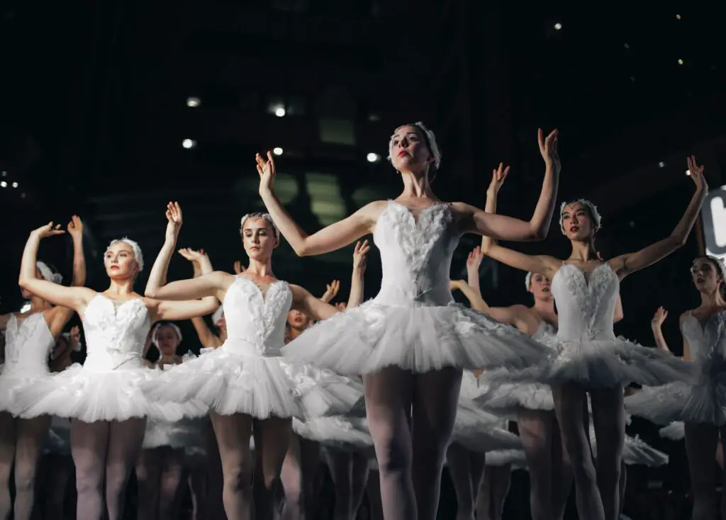 ballet-dancers-performing-extracurricular-on-stage-black-swan