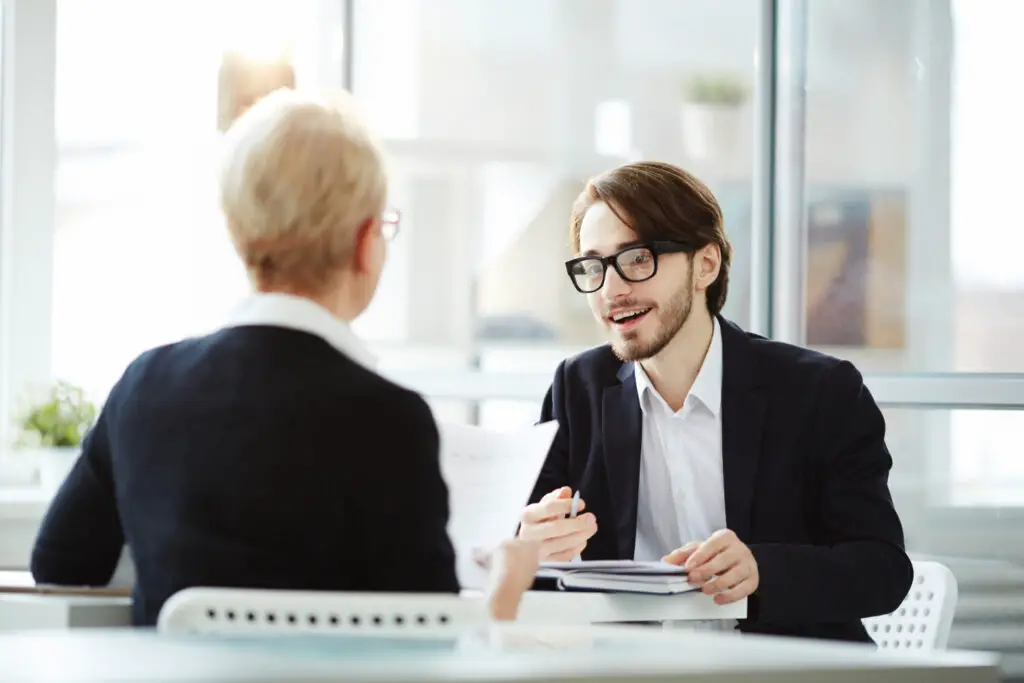 promising candidate discusses with interviewer why he chose to apply for a different career