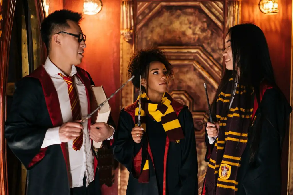 three-students-wearing-harry-potter-movie-costumes-at-a-college-party