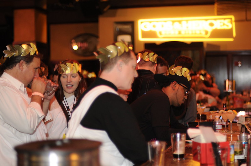 college-students-wear-makeshift-togas-costumes-and-headgear-for-a-toga-college-party-theme