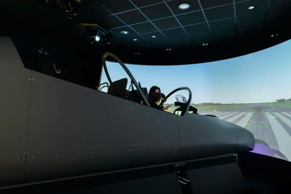 Aeronautics majors testing aircraft during flight simulation