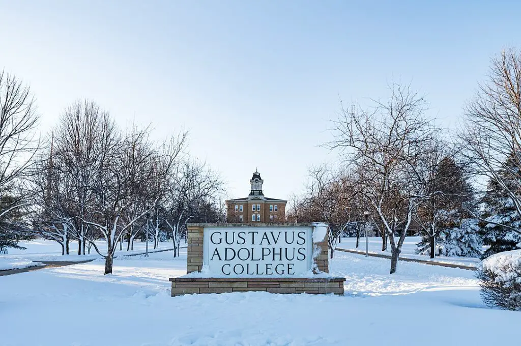 The snow-covered entrance and campus of Gustavus Adolphus College