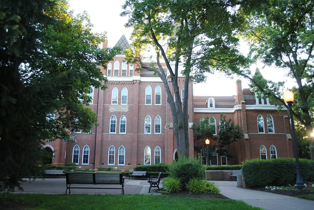 The Towers Hall at Otterbein University surrounded by lush greenery