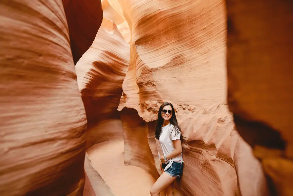 A female college student posing for a picture inside the Grand Canyon in Phoenix, Arizona