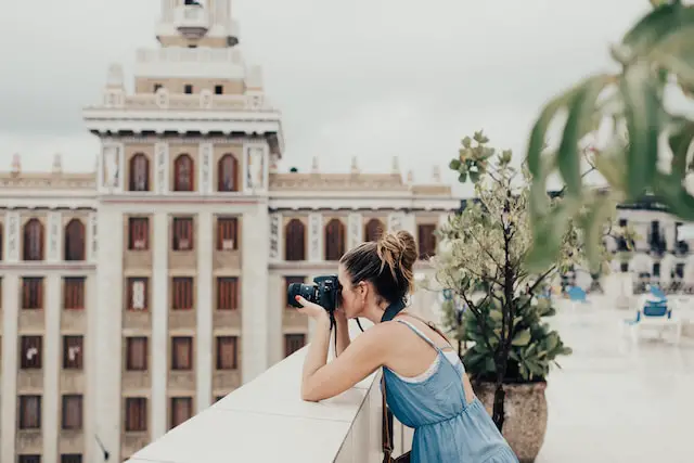 female-college-student-taking-a-picture-of-the-view-in-Havana-Cuba-to-complete-study-abroad-program
