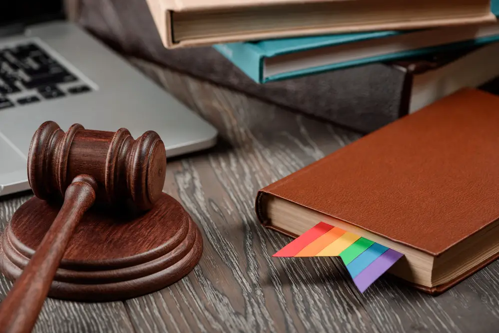gavel-and-books-with-rainbow-strip-as-bookmark