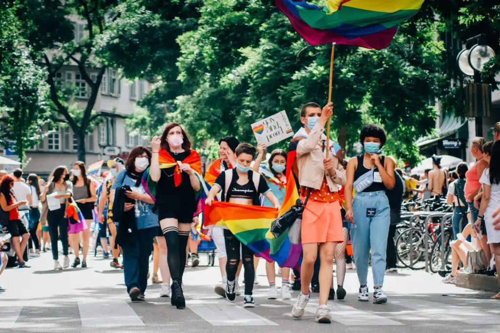 people-holding-rainbow-flags-at-pride-parade