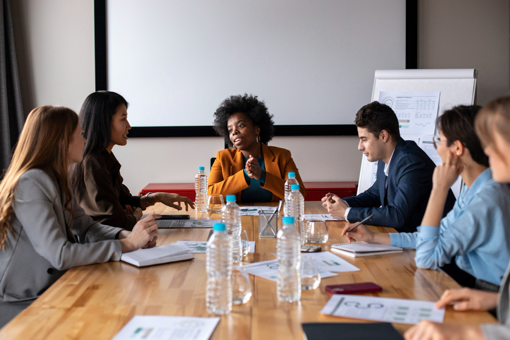 An African-American female executive shares her insights to her team from attending one of America's colleges producing CEOs