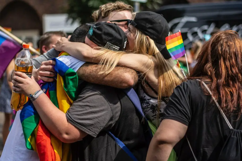 people-hugging-each-other-in-the-crowd-during-pride-festival